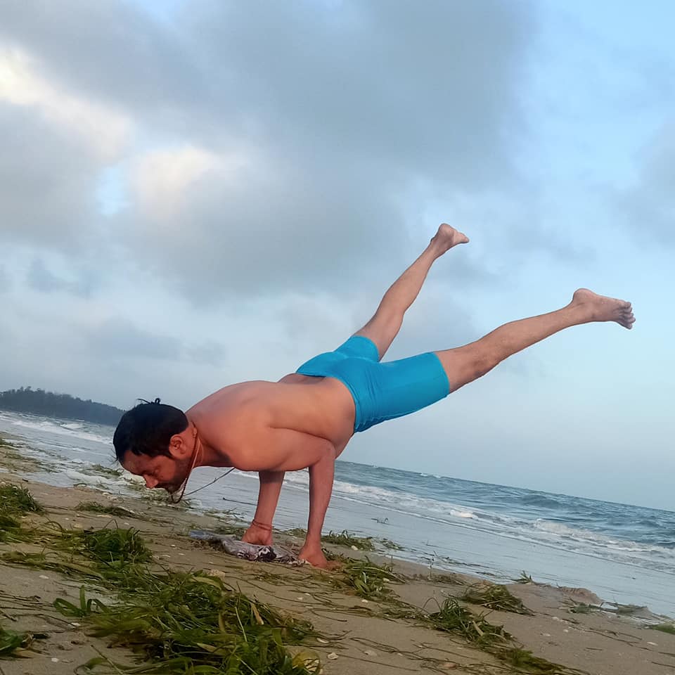 Mayurasana variation — peacock pose