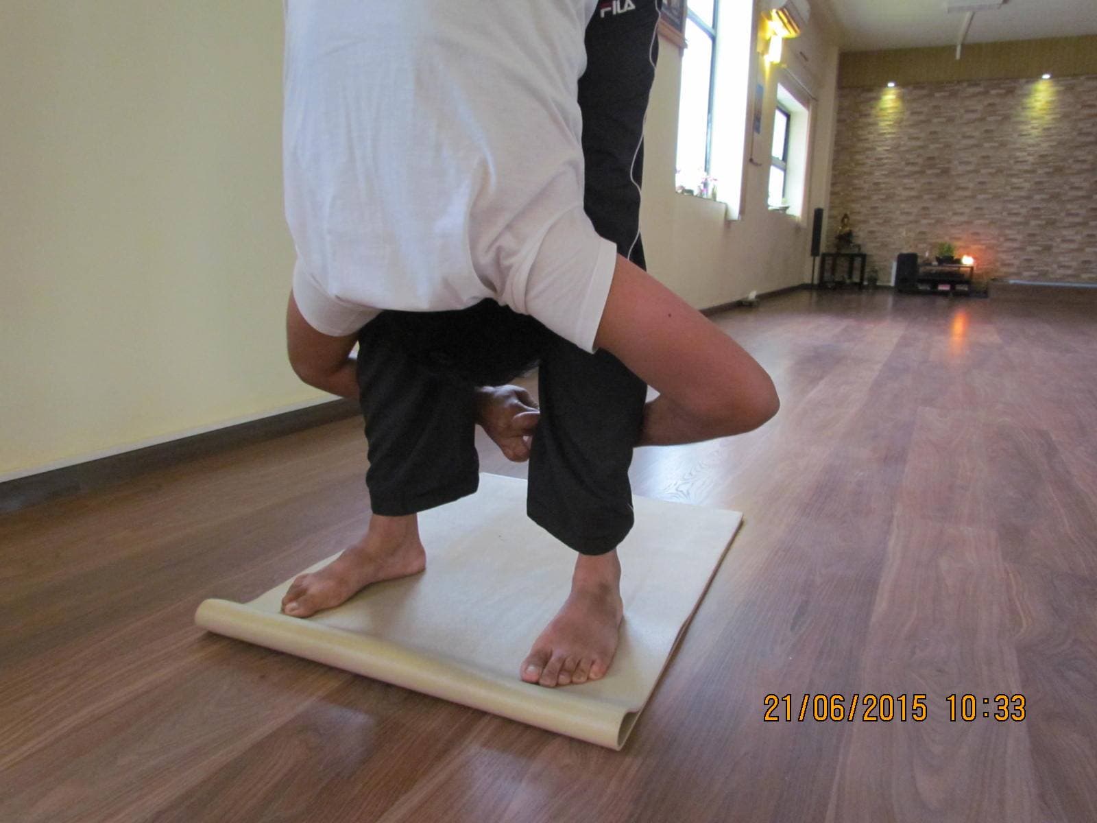 Hastapadasana — standing forward bend